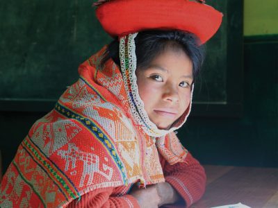 local Peruvian girl dressed in traditional wear