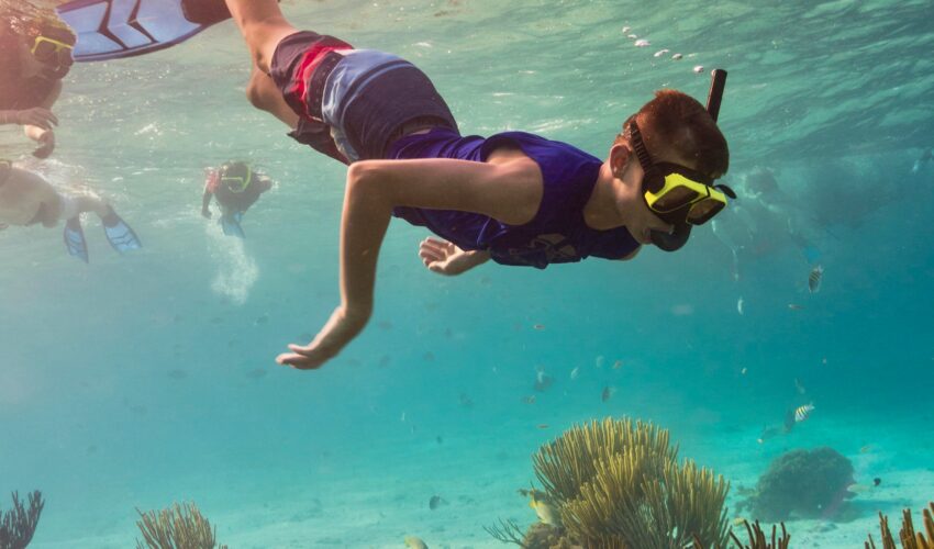 Boy snorkelling Camps International