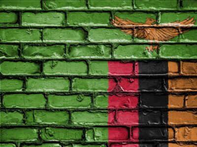 Zambian Flag painted on a wall.
