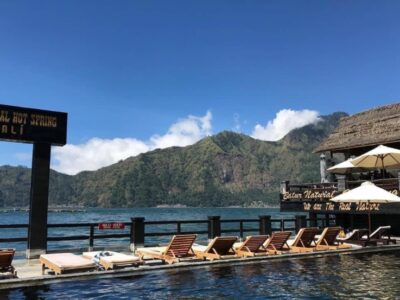View from deckchairs of the mountains at natural hot spring.