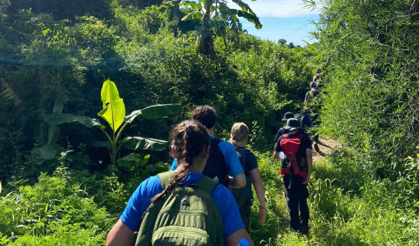 Travellers hiking in Cambodia