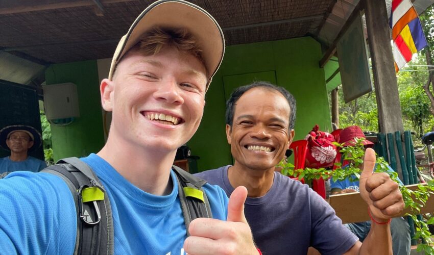 Traveller and camp crew in Cambodia