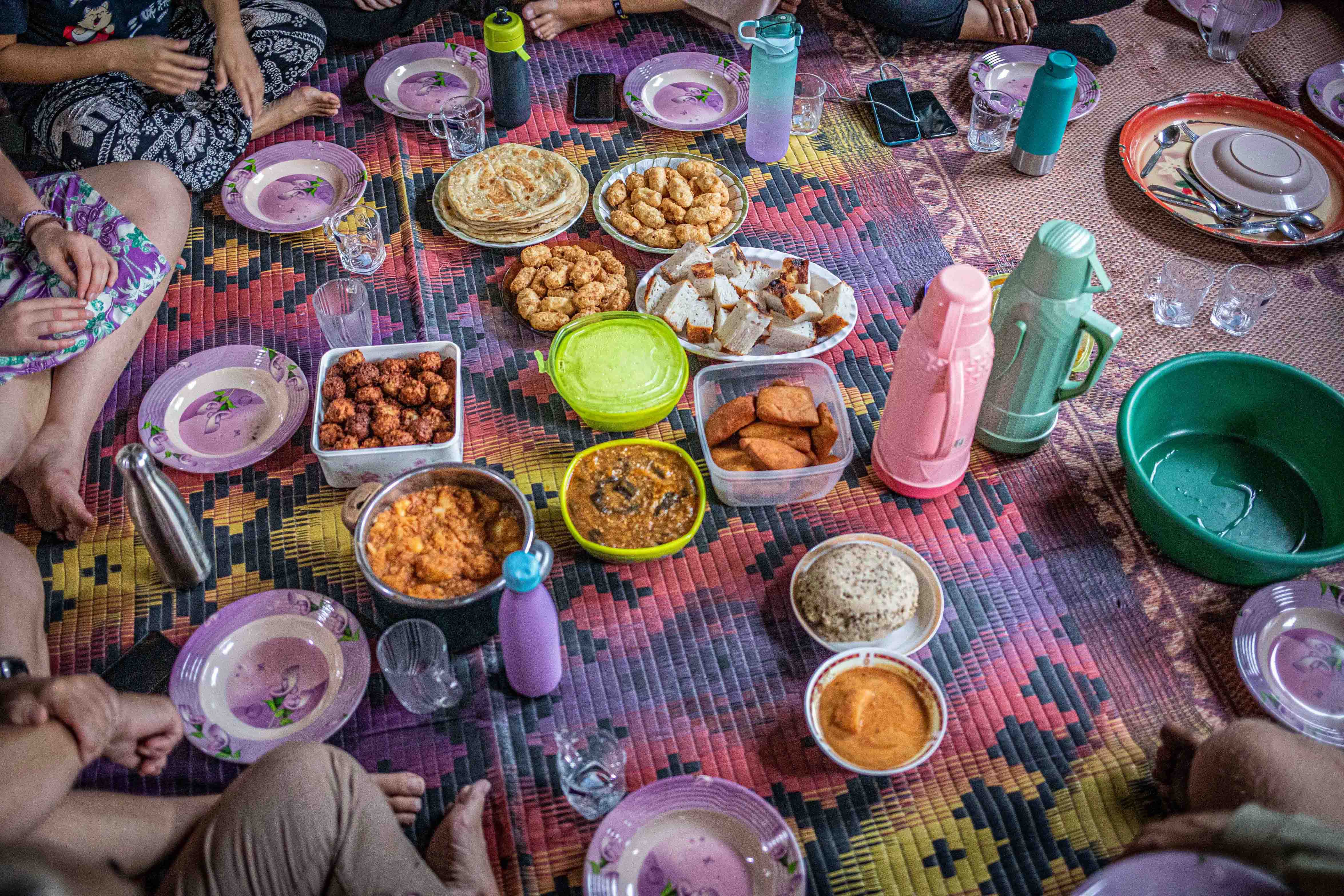 Travellers enjoying local food, Zanzibar