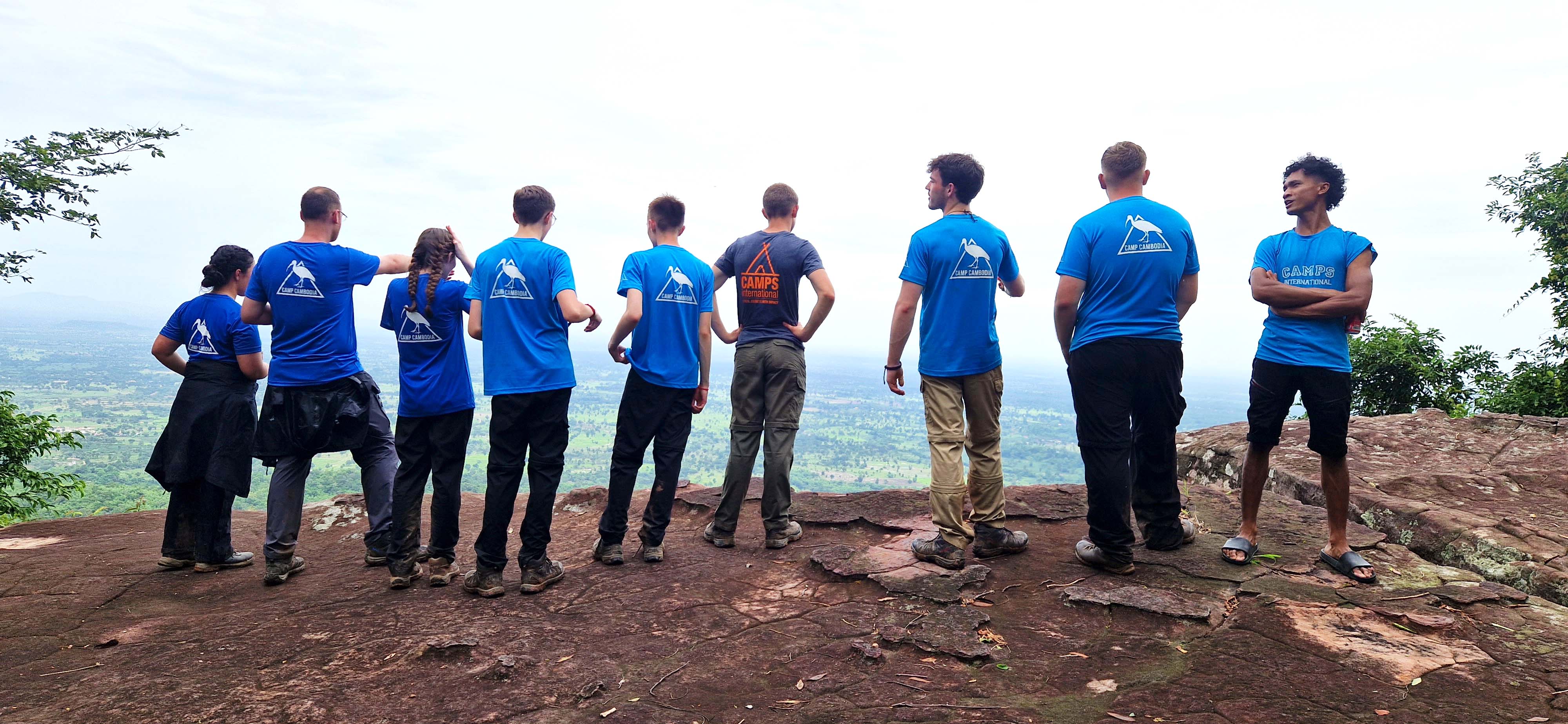 A group of travellers looking at the vista in Cambodia