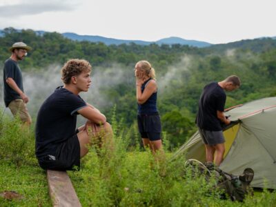 Travellers setting up tent accommodation. Costa Rica