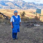 Epifania standing in front of mountains in Peru