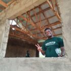 Hassan working on the build of a house