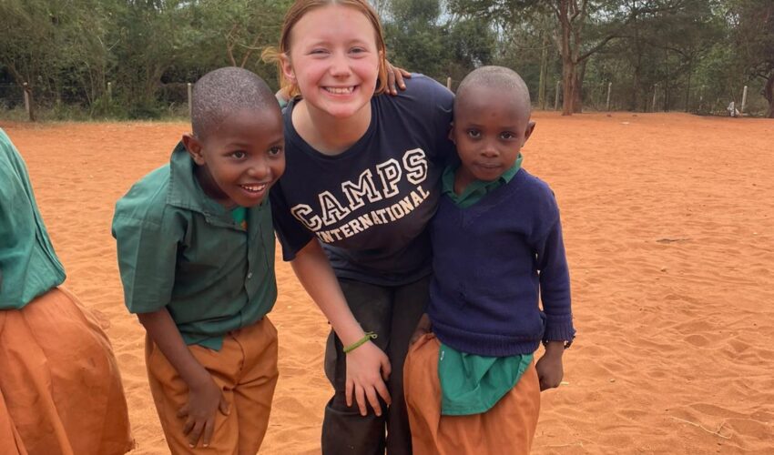 Traveller and local children in camps Tsavo, Kenya