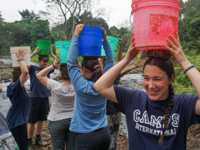 Group of students on a Camps International expedition in Africa learning lessons beyond the classroom.
