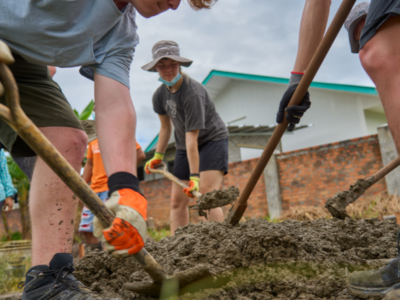 Group of students on a Camps International expedition working on service learning projects and learning lessons beyond the classroom.