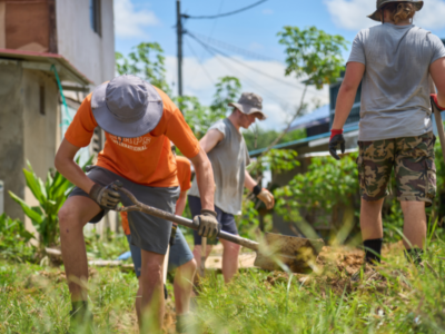Group of students on a Camps International expedition working on service learning projects, environmental conservation and learning lessons beyond the classroom.