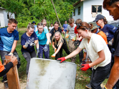 Group of students on a Camps International expedition working on service learning projects and learning lessons beyond the classroom.